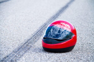 an accident with a motorcycle in Sandy Springs, GA. traffic accident and skid marks on road. symbol photo.